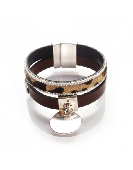 Manchette cuir et médaille